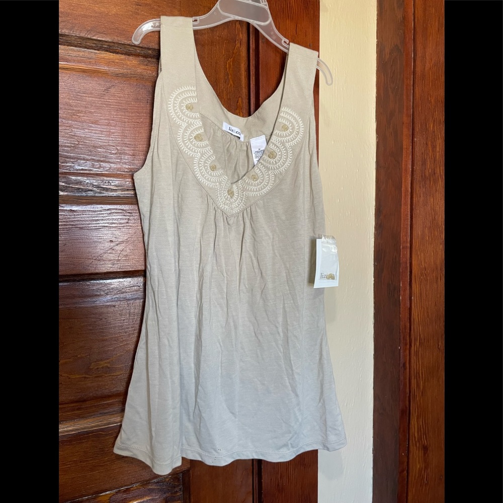 V neck shirt with beads.